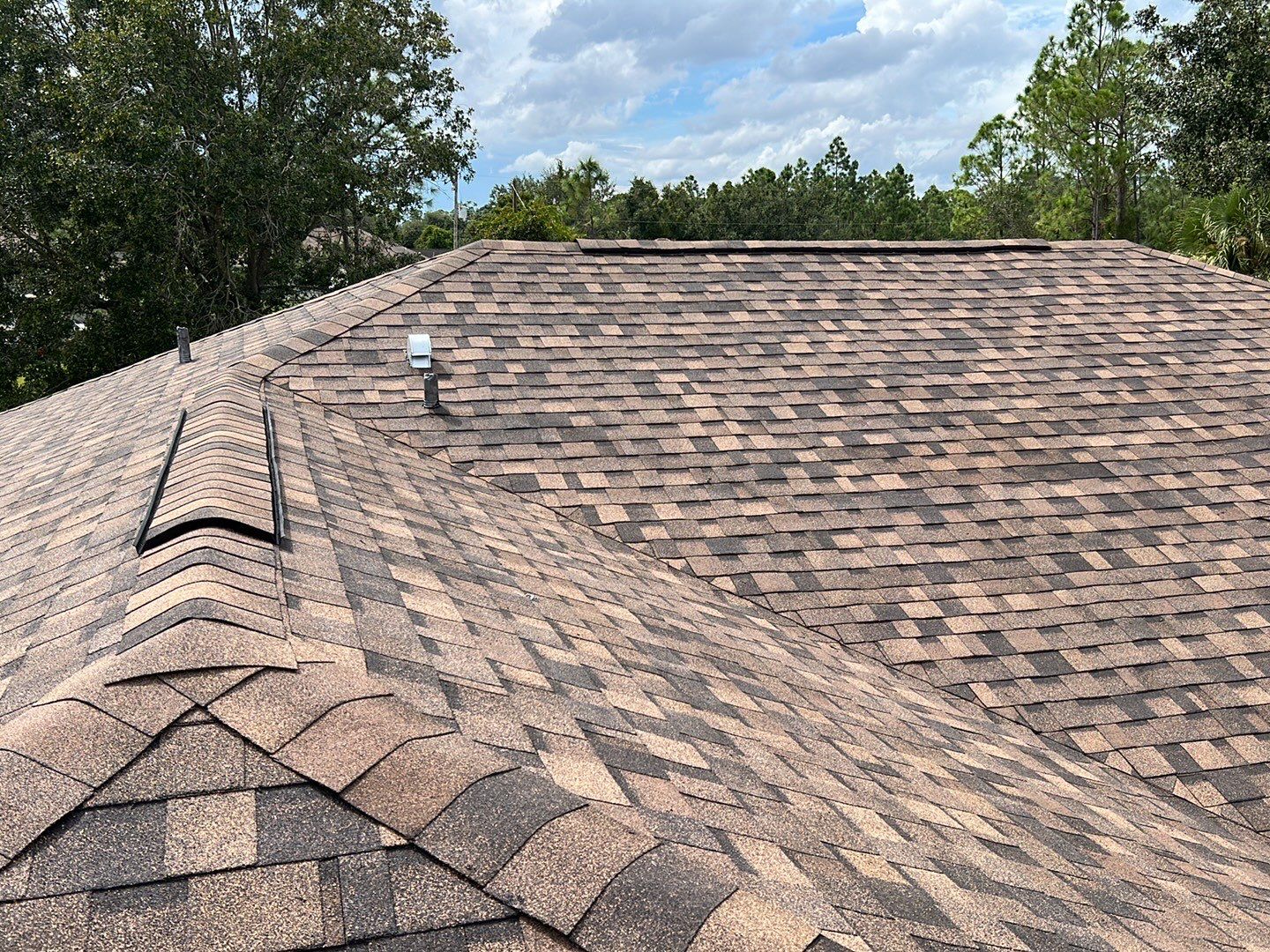 Rust colored roof - Roof Maintenance Services Sarasota, FL